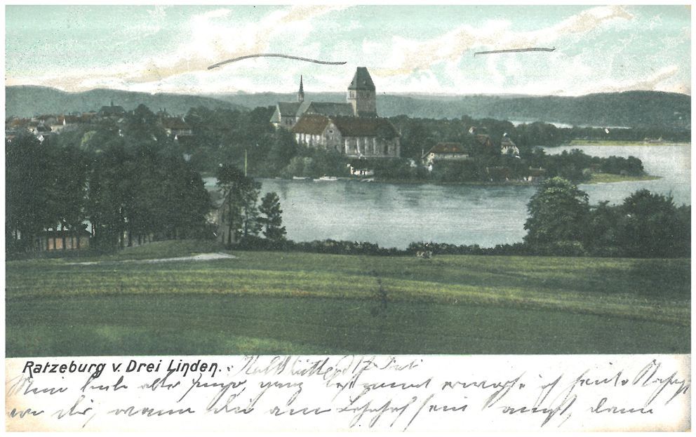 The postcard shows a typical motif: the view of a town with a church in the middle embedded in a landscape depicting woods, fields, hills and water. The picture is colorized, underscoring contemporary notions of the aesthetic and natural character of the scene. Such scenes are not just typical of German postcards but were common around the world at the turn of the twentieth century. The postcard was an everyday form of communication, not made and sold for tourists alone but popular among locals as well.
<br />
Photographic postcard, colorized: “Ratzeburg v. Drei Linden” ca. 1905 /1906, Verlag Ottmar Zieher, Munich 8.8 x 14 cm, postmarked July 18, 1906. Source: Private collection of J. Jäger, with kind permission